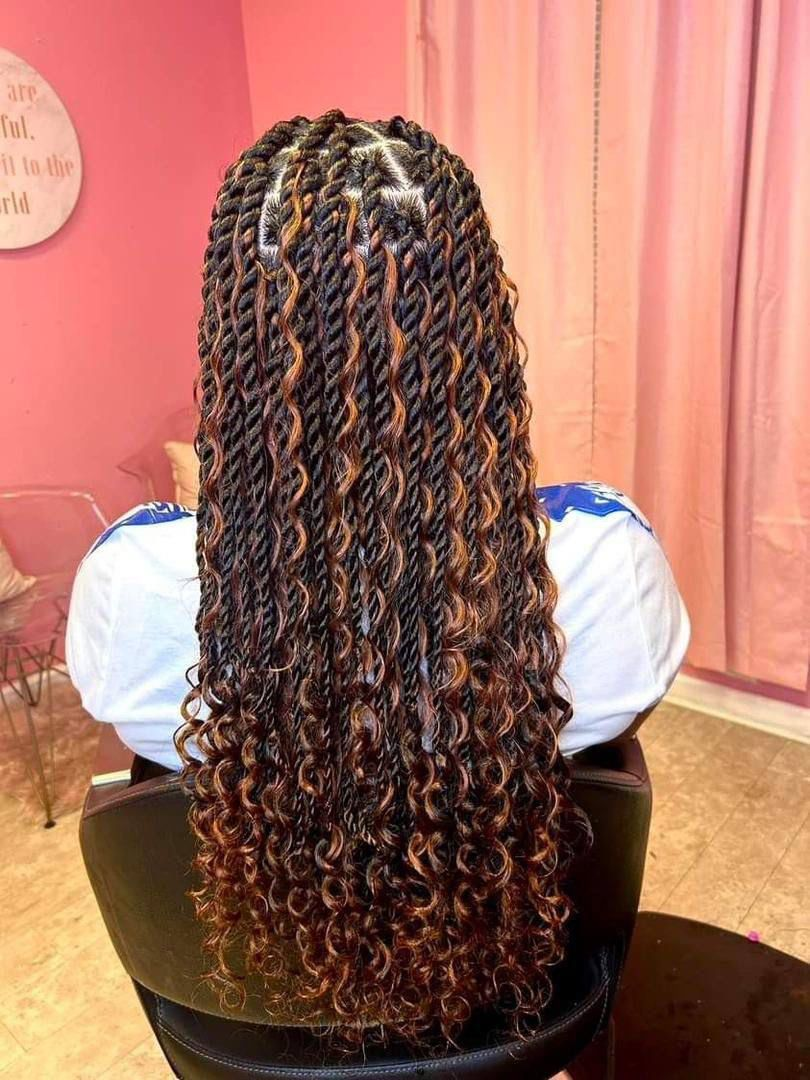 Twists with caramel highlights and curly ends
