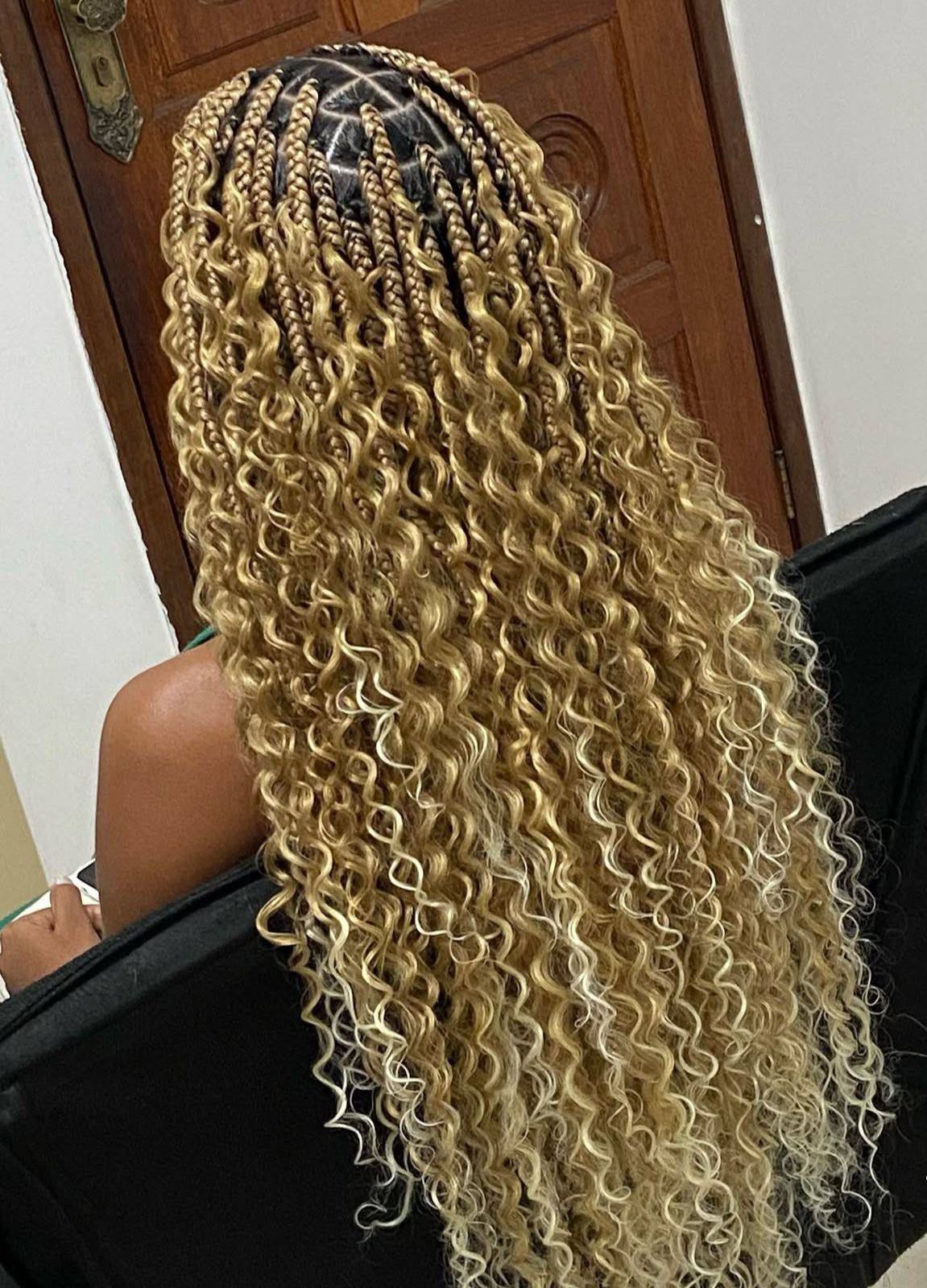 Blonde boho braids with extra-long defined curls