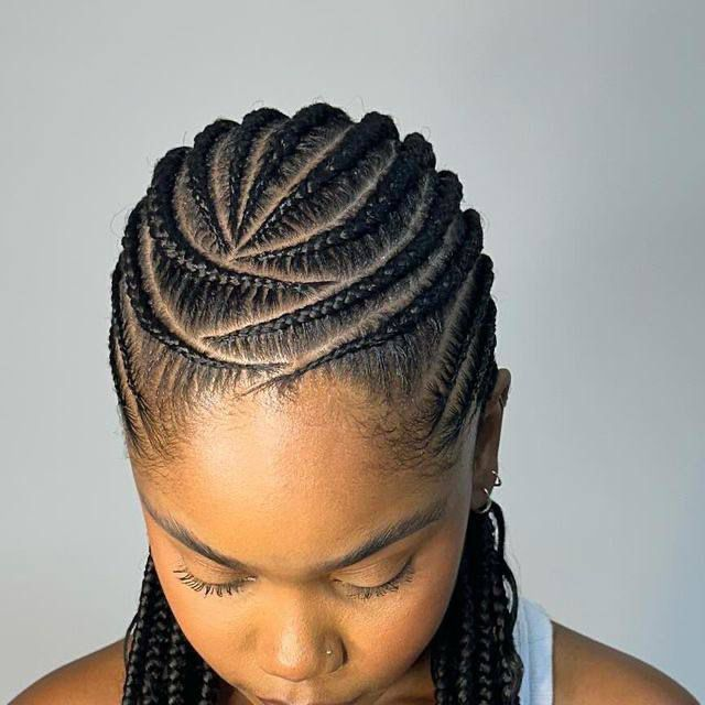 Men’s cornrow braids with a sharp fade